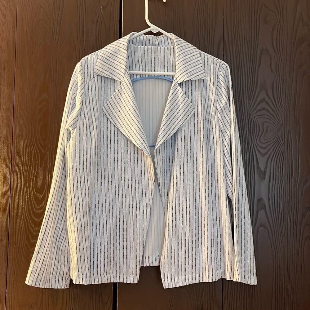 Chico’s white with navy blue and lt blue stripes jacket. Size XXL